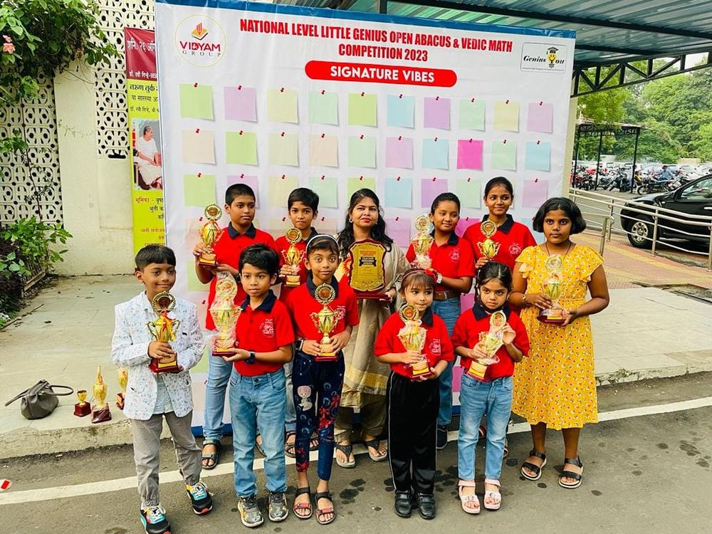 Smart Kids Study Circle students with trophies at National Level Little Genius Open Abacus & Vedic Math Competition