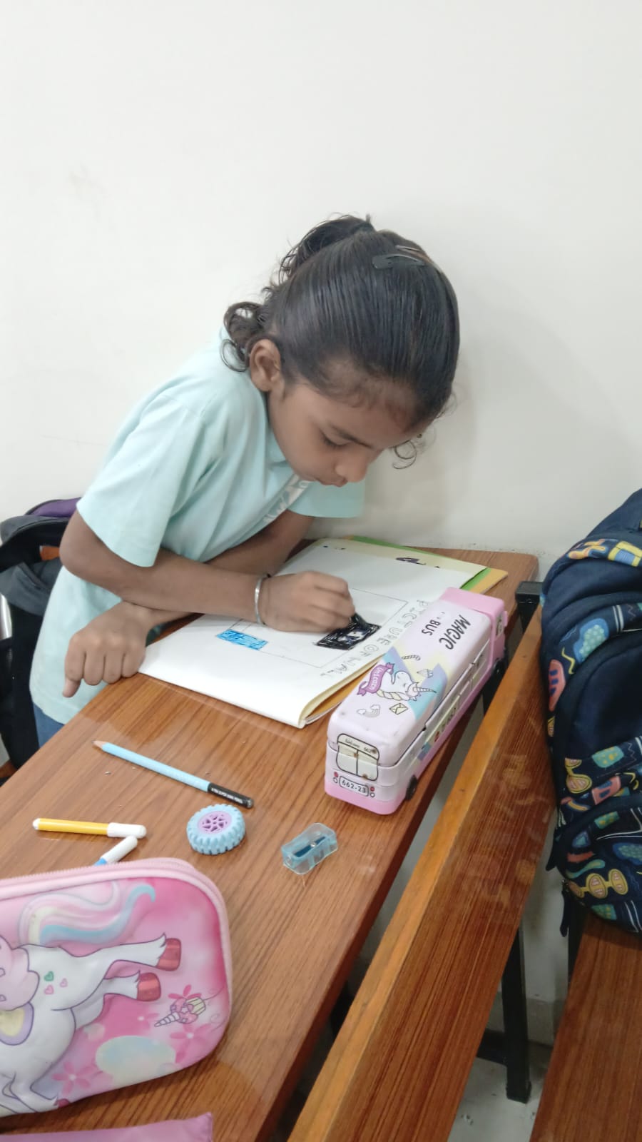 Student drawing a sketch at Art Therapy Workshop Smart Kids Study Circle