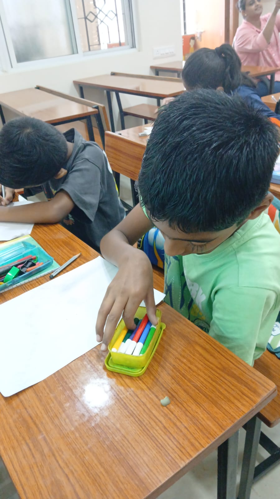 Student working on art activity at Smart Kids Study Circle Art Therapy Workshop