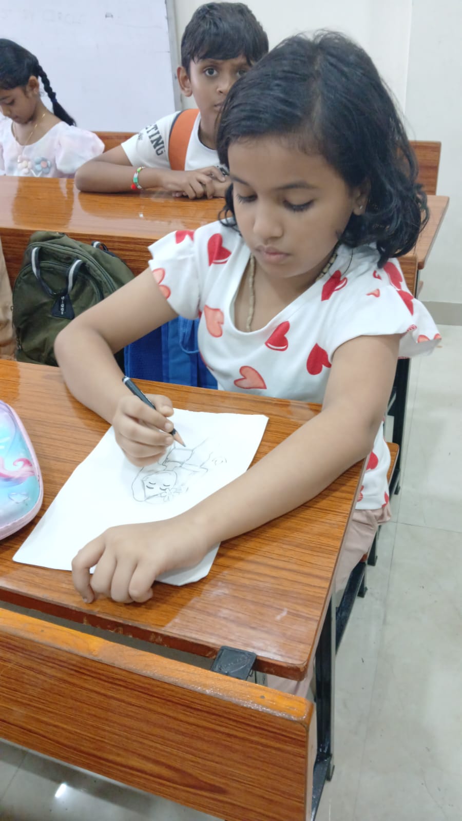 Student with oil pastels and art supplies at Art Therapy Workshop Smart Kids Study Circle